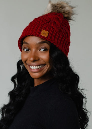 The kyrie Cable Knit Pom Hat